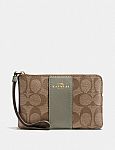 Coach Corner Zip Wristlet In Signature Canvas (Various colors) $20